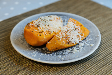View of delicious sweet potatoes dish.Delicious sweet potatoes on plate high angle.Sweet potatoes with parmigiano