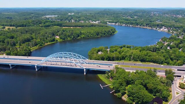 John Greenleaf Whittier Bridge on Merrimack River aerial view in summer between city of Amesbury and Newburyport near river mouth to Atlantic, Massachusetts MA, USA. 
