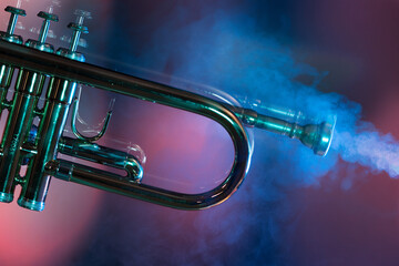 Trumpet in mist and with colorful background