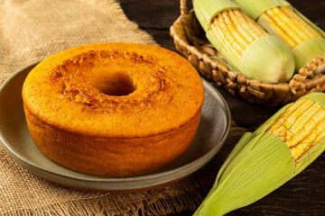 Delicious corn cake on table. Typical Brazilian cake. - obrazy, fototapety, plakaty