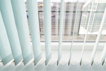 Vertical blinds for windows.Vertical blinds in the office.