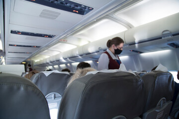 The interior of the aircraft.View from the passenger side, who is sitting on the plane.