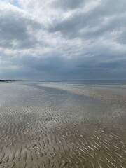 sand dunes and clouds