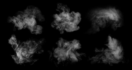 Fog or smoke set isolated on black background. White cloudiness, mist or smog background.