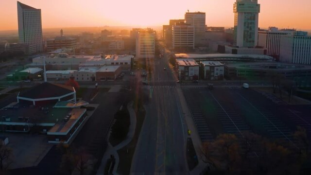 4K Drone Aerial Sunrise Downtown Wichita Kansas Skyline Street Reveal