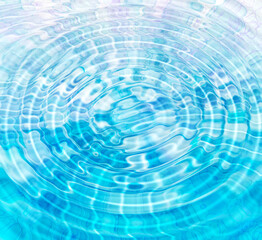 Blue abstract background with water ripples and bubbles