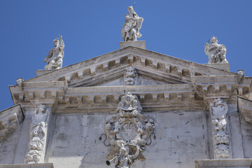 Fototapeta na wymiar Baroque Facade of San Moise Church (Chiesa di San Moise, 1668) - Roman Catholic church in Venice, Italy.