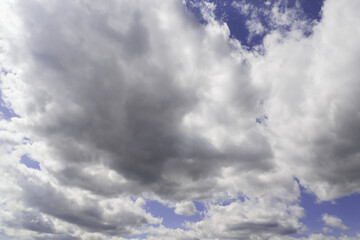 Beautiful clouds in the sky. The cumulus clouds are high in the air.