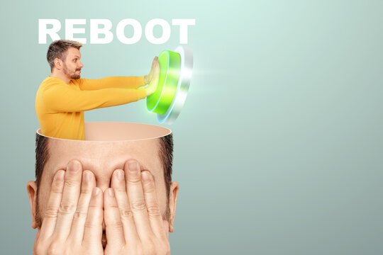 In the man's head, the brain presses the reset button. The concept to charge the brain, support the mind, help memory, rest, peace, day off.