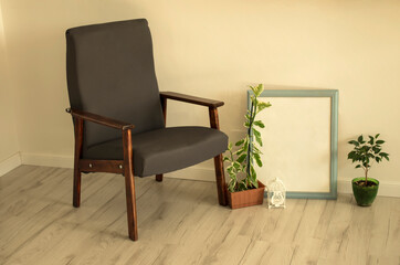 grey retro chair in the modern interior of the apartment and house. cozy interior. plants in the house. scandinavian style. modern minimalism.