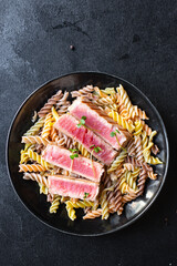 tuna pasta fusilli seafood roasted fish fried grilled second course meal snack pescetarian diet copy space food background rustic top view vegetarian food 