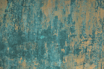 The texture of a worn metal surface with traces of old paint.