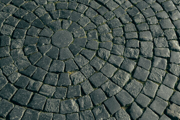 Cobblestone street. View of texture of the city pavement.
