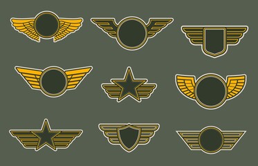 Army patches with wings, heraldic icons, vector winged insignia or emblems. Air force of round, shield and star shapes isolated on khaki colored background. Retro badges for officers or soldiers © Vector Tradition