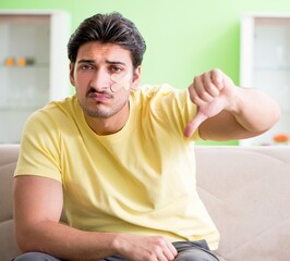 Young man at home after injury