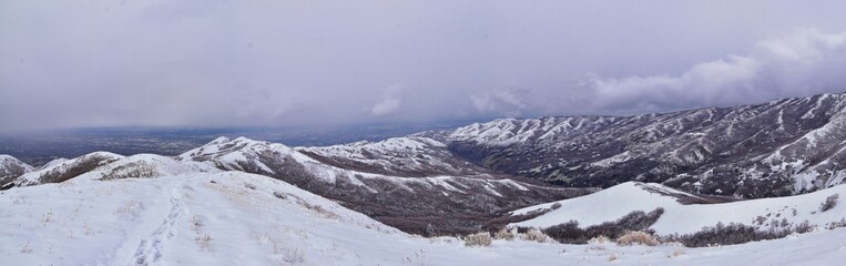 Little Black Mountain Peak hiking trail snow views winter via Bonneville Shoreline Trail, Wasatch Front Rocky Mountains, by Salt Lake City, Utah. United States.
