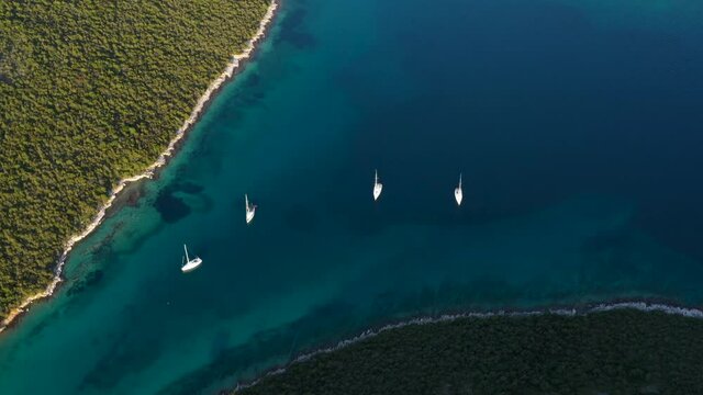 Motorboats Sail On The Waters Of Adriatic Sea Near Dugi Otok Island In Croatia. aerial
