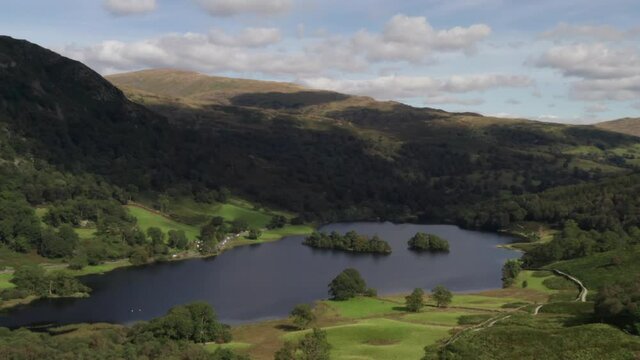 Drone shot panning out of a scenic view of Rydal in English The Lake District. Stock footage video clip