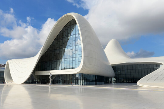 Heydar Aliyev Cultural Center in Baku, Azerbaijan. Architecture style by Zaha Hadid. Flowing and curved building built with white concrete and glass