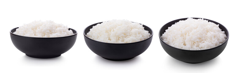 Rice in black bowl isolated on a white background