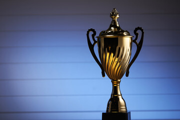 Fototapeta premium Gold award on white background with blue color light