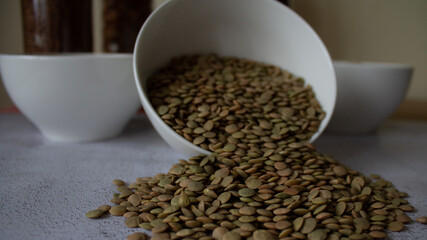 grits scattered from a white plate