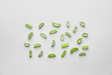 Fresh cut aloe on light background
