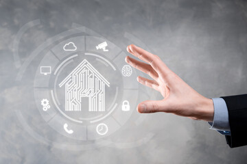 Businessman hold house icon.Smart home controlled, intelligent house, and home automation app...
