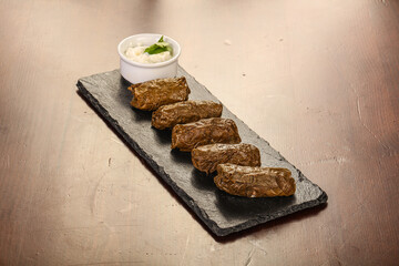 Staffed dolma in grape leaves