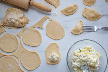 Pierogi ruskie, Baked dumplings stuffed with curd cheese and potatoes