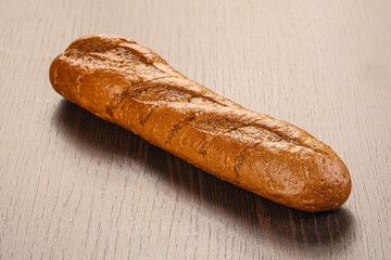 Crust tasty baguette over board