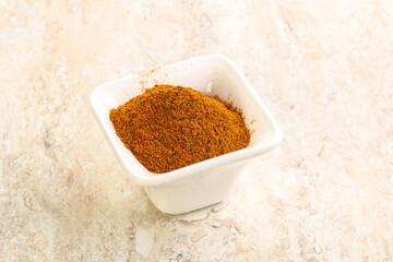 Dry Paprika powder in the bowl