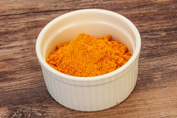 Tumeric powder in the bowl