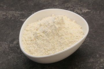 Wheat flour heap in the bowl