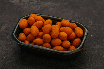 Spicy peanut heap in the bowl