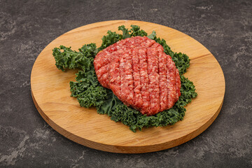 Raw beef burger cutlet for cooking