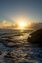 Fototapeta na wymiar sunrise reflecting over the ocean 
