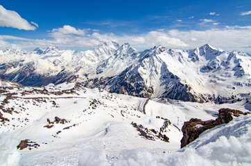 Fototapeta na wymiar Panorama of a beautiful mountain landscape in the Elbrus region of Kabardino-Balkaria. Mountains in the snow