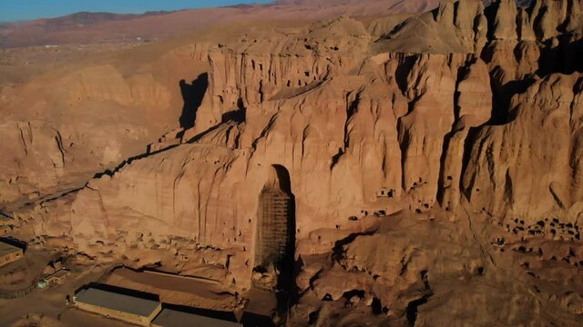 Ancient Buddha Sites At The Side Cliff In Bamyan Valley Of Central Afghanistan. - Aerial Shot