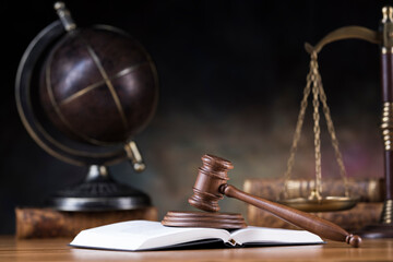 Obraz na płótnie Canvas Law and justice concept, wooden gavel, globe background