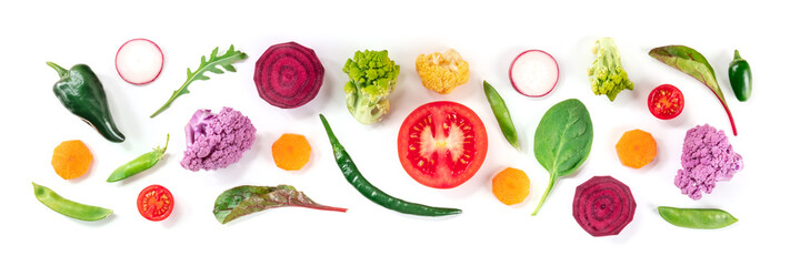 Fresh vegetable panorama with a variety of healthy vegan salad ingredients, top shot on a white background