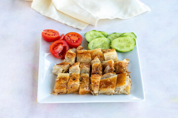 Turkish style meat stuffed filo dough borek served kol boregi.