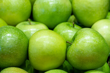 Organic green apple. Close-up apple background
