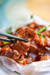 A delicious Chinese dish, paper-wrapped pork ribs