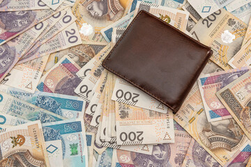 leather wallet with calculator on polish zloty banknotes