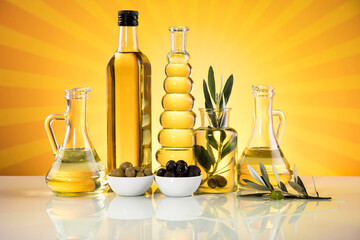 Bottles of olive oil, olive branch and Cooking oils