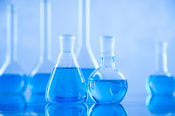 Laboratory beakers,Science experiment, blue background