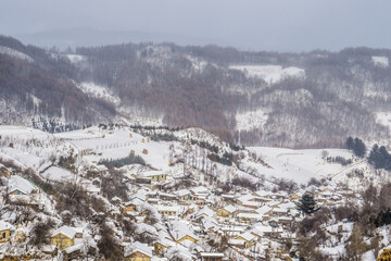 Fototapeta na wymiar Forests and villages in jilin, China, after snow in winter