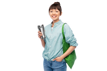 sustainability and people concept - asian woman in turquoise shirt with thermo cup for hot drinks and green reusable bag for food shopping over white background