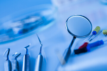 Dentist equipment on blue background